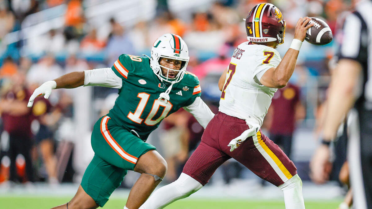 Miami Hurricanes defensive end Damon Wilson II (10) defends against Central Michigan Chippewas quarterback Angel Flores (7) during the University of Miami’s 52-3 rout at Hard Rock Stadium on Sept. 26, 2026.